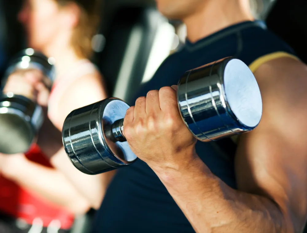 Person lifting a dumbbell